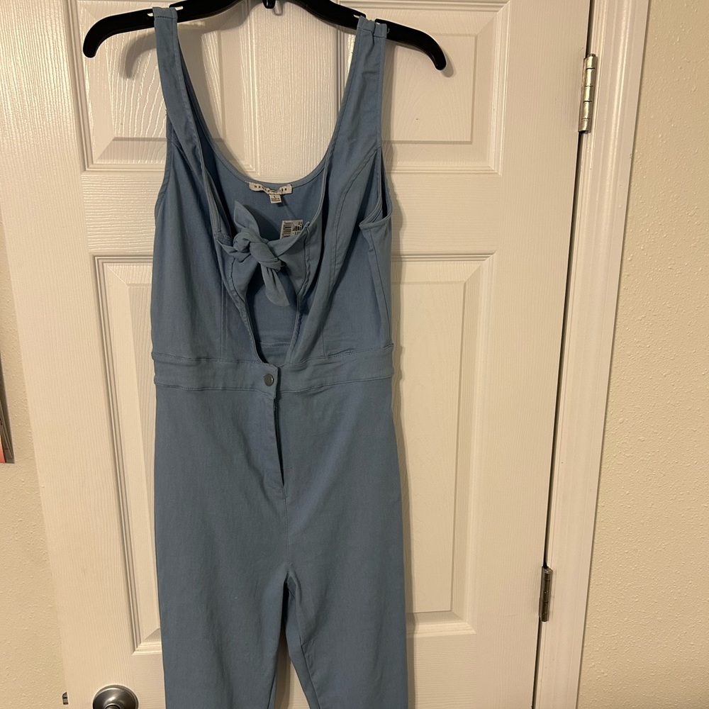 Very Pretty Jumpsuit. Never worn. Still has Tag. Bought from City Trends.